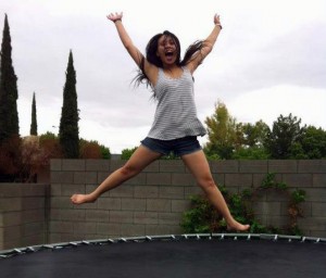 Ashley Tolentino jumps up as high as she can on a trampoline while bonding with other Sudent Council students.<br />Photo Credit: Kristelle Dealca