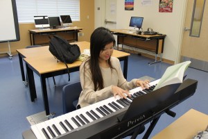 Lichelle Gaerlan plays enchanting tunes to calm her spirits after a stressful day.<br/>Photo Credit: Southwest Shadow Staff