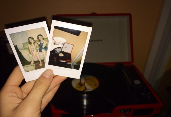 Love for inanimate objects is completely acceptable and recommended, such as my love for capturing moments on polaroid film and my record player.  Photo Credit: Alex Nedelcu