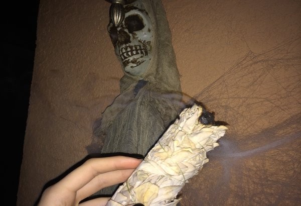 Not that I consider myself to be more superstitious than the average teenage girl, but burning sage onto the Halloween decorations that are hung on my house seems like the best idea to help me overcome my fear.  Photo Credit: Alex Nedelcu