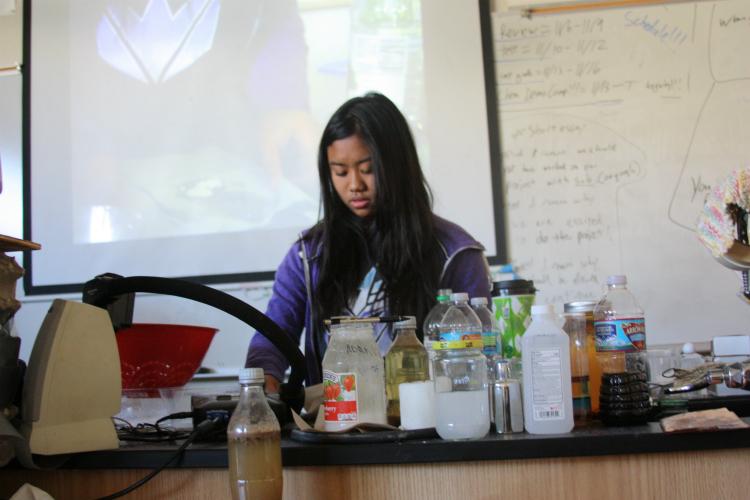 Sophomore Kaitlan Gutierrez presents her demo turning milk into stone. "I turned milk into stone by using simple materials such as milk and vinegar. When I let the certain substance sit out in room temperature for a couple of hours, the milk had succeeded into turning hard like stone," Gutierrez said.