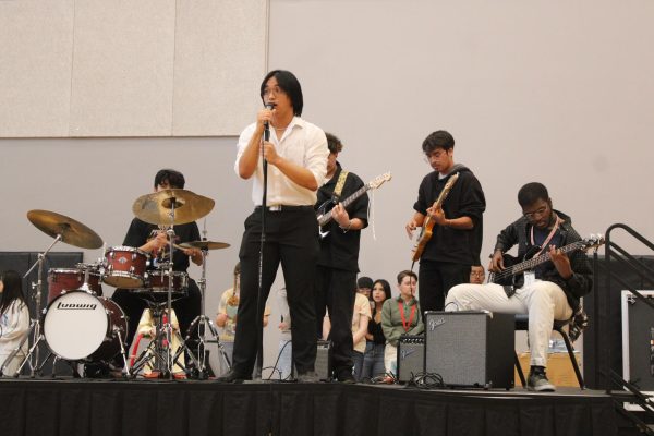 During last year’s Coyote Coachella, performer Aerhann Casupang sings “Freaking Out the Neighborhood” by Mac DeMarco for the crowd. The event allowed him to share his talent with the school community. “I was a little nervous to perform at first,” Casupang said. “After a little I was not really nervous because my friends came to support [me].”