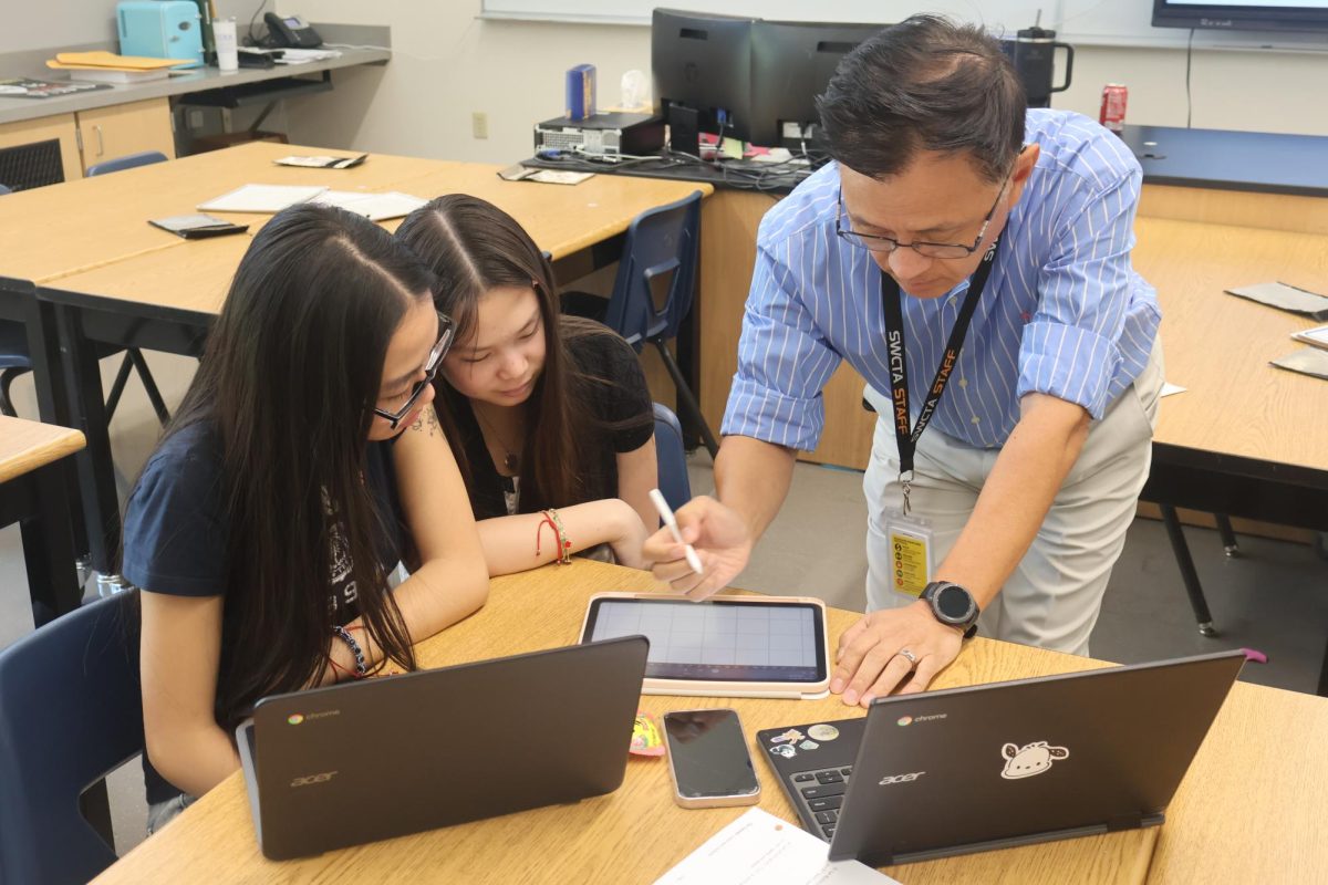 Receiving help on Delta Math from her Guidance teacher, senior Kyra Hee makes an effort to further her understanding of calculus. They reviewed the homework assignment given the previous day. “I took Guidance when I was taking AB as well and it was really helpful,” Hee said. “I had an extra class to ask for help and to get tutored. I felt a lot less overwhelmed than I thought I would be.”