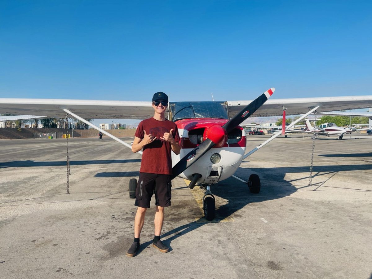 Standing in front of the aircraft, senior Mason Teschler gets ready to do his solo flight at the Jean Airport. “This was one of my biggest accomplishments throughout my journey,” Teschler said.
“This was my first ever solo flight, though it was scary at first because of the small space, it was not a problem.”