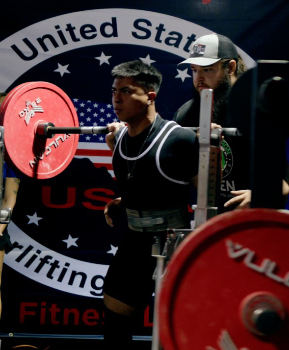 Preparing to squat during a competition, sophomore Larry Fulgencio readies to lift a record-breaking squat. He got first place in weight class and age division. “This was one of my most challenging yet rewarding moments I have been lucky enough to accomplish,” Fulgencio said. “It will always be in my memories.”