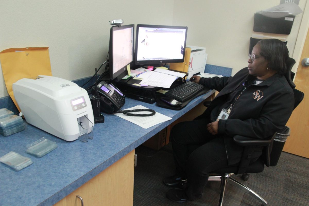 After a student lost their lanyard, attendance clerk Sonya Jones reprints a student ID. The $10 fee will be charged to a student’s account and can be paid at the banker. “I feel like the temporary sticker IDs were fine last year, and obviously they were only $1, so that’s a big difference compared to this year,” junior Jenny Nie said. “I do feel like reprinting the lanyards could be beneficial because if a student is always forgetting them then they might need a backup.”