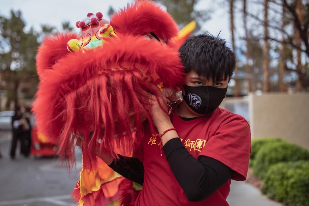 On the day of his performance, junior Ryan Cruz prepares himself and tries to calm his nerves for the event. For Cruz, lion dancing is an expressive outlet that brings emotion to any spectators that check out his performances. “It’s really fun for me, honestly,” Cruz said. “I like jumping around, or running around. I really like [pretending to] bite people as the lion. It means a lot to me that I’m able to make people smile, whether it is making them think that I brought them good fortune, or doing those random things to kids to cheer them up because they’re really scared.”