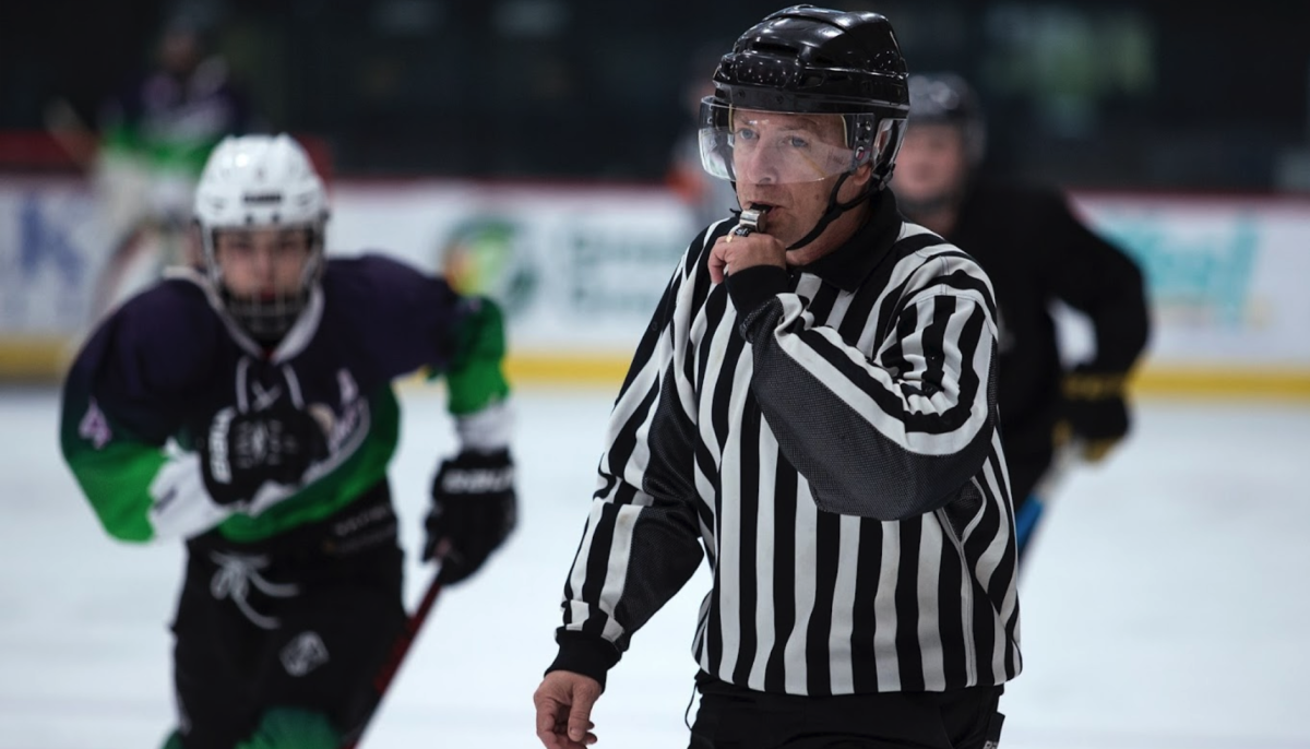 Out on the ice during a college game, video production teacher Ernesto Zita runs up and down the ice ensuring a fair game. Zita served as a ref for a JV match at the City National Rink in Vegas earlier last month. “My favorite part of my job is when the game starts and I’m able to focus on the game; focus on what's happening on the ice,” Zita said. “I like that high tension, I thrive in environments like that.”