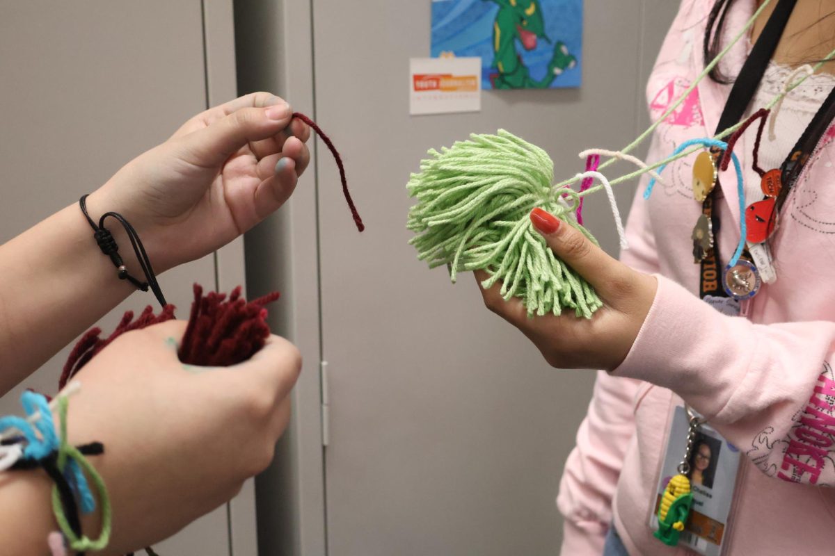 Students exchange compliments with their peers while giving out yarn from their ‘warm fuzzies.’ This event created moments of kindness that will be remembered after the activity ends. “Warm fuzzies are something people can wear around their neck on Valentine's day,” Senior Class Secretary Alexis Taing said. “You can give out words of affirmation, like saying, ‘Hey! You have a nice outfit today.” 