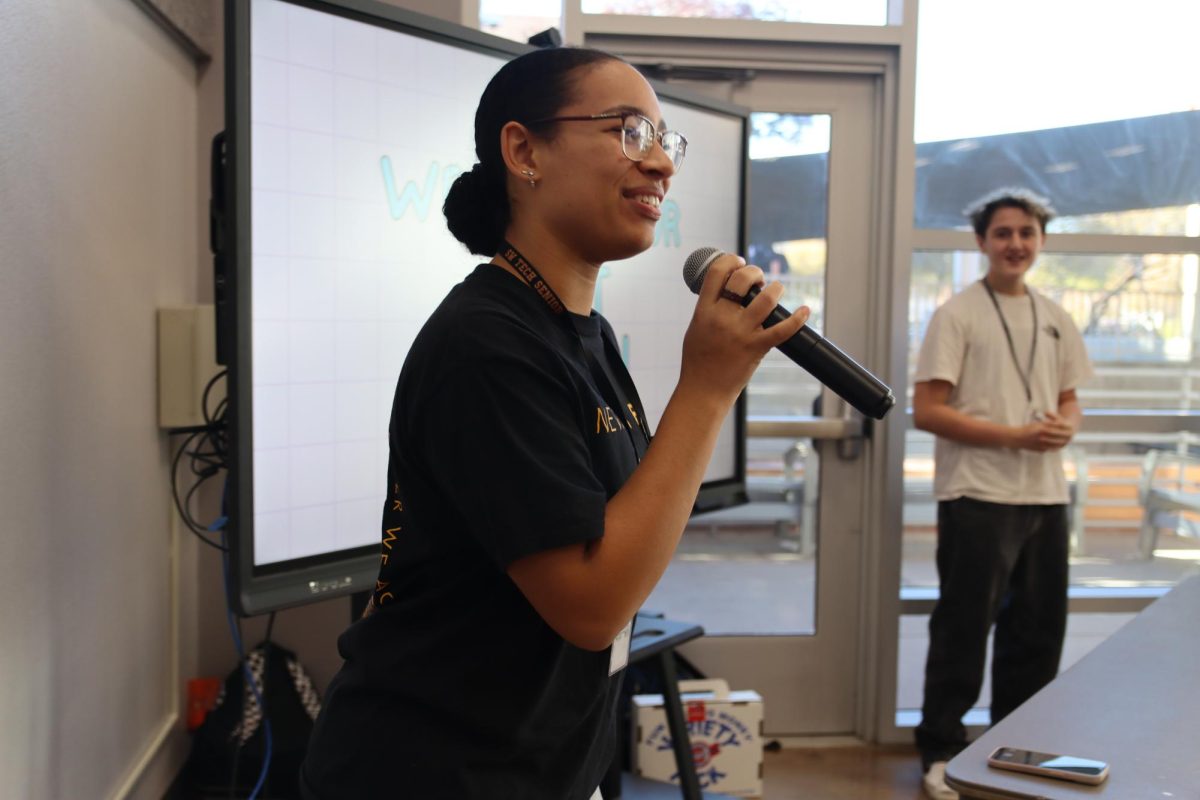 Leading a general meeting, FBLA President Aryana Boyd speaks to the members. Necessary information relating to state was given out at these general meetings and workshops were hosted to help members prepare for their competitions. “Our most recent meeting, we went over role play events,” Boyd said. “At state, they’ll give you a strip of paper and you have a certain amount of time to answer the question on it. The board gave the members practice questions and just had them answer it in the same style they would at the competition. We felt like this gave them really good practice so hopefully they’ll be more than prepared for this upcoming week.”