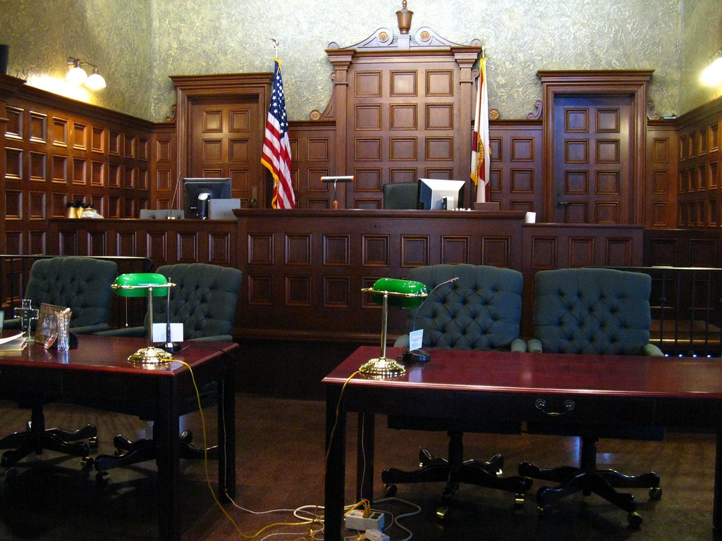 "Courtroom" by srqpix is licensed under CC BY 2.0. To view a copy of this license, visit https://creativecommons.org/licenses/by/2.0/?ref=openverse.