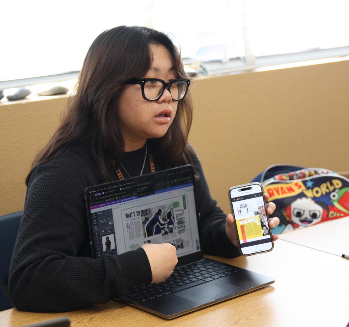 Communicating with their group, group editor Drue Ramos provides ideas for yearbook spreads. As a second-year editor, Ramos helped to ensure deadlines were met. “So far, we’ve only had two deadlines and they’ve gone pretty smoothly,” Ramos said. “To be honest, we’ve gone one or two days over the deadline, but it’s okay because after all the mistakes that we’ve made, we’ve been able to overcome them. Now going into this next deadline, I’m making sure that each day that we do, the spread is going according to plan.”