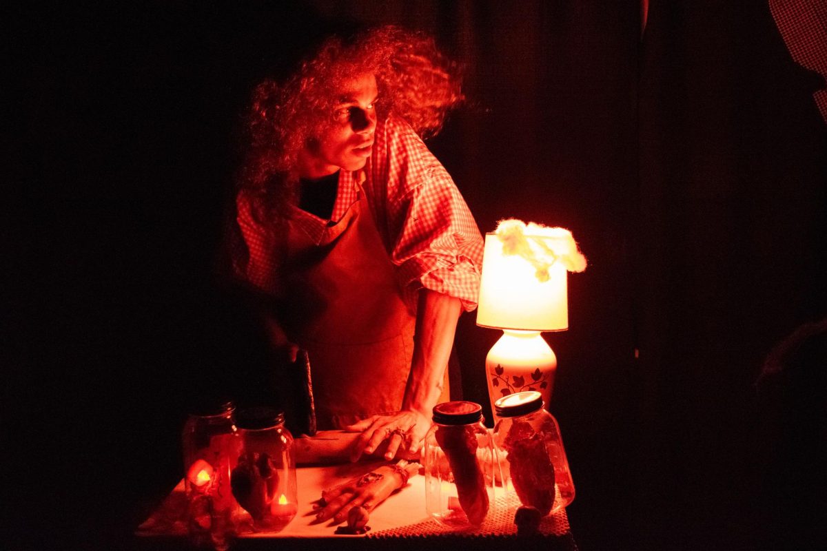 Cleaver in hand, Erevis Sosniak gives an eerie performance as a butcher inside the haunted house.