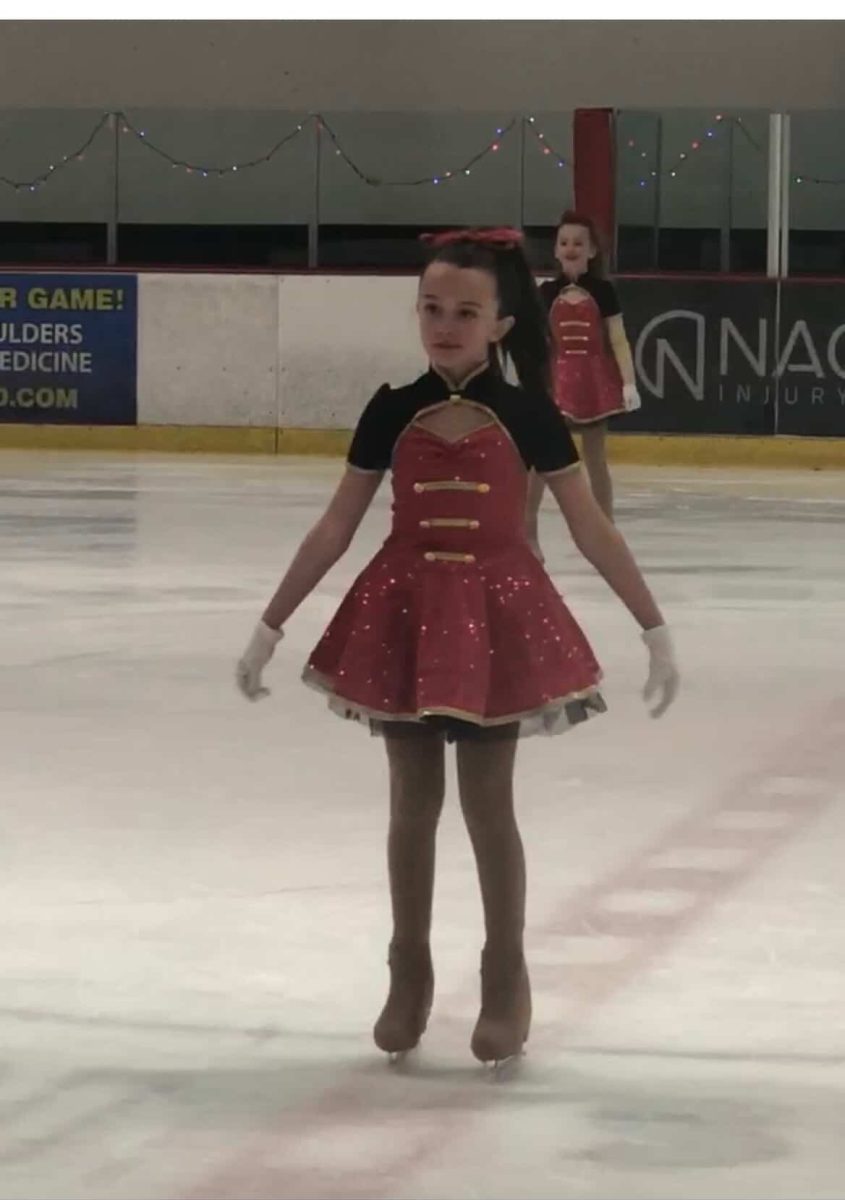 Waiting patiently for her music to begin, Adams' keeps her balance on the ice. "We were dancing to Justin Bieber's version of a Christmas song, " Adams said. "That performance definitely stays with me, it was fun." 